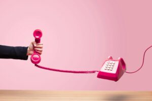 hand holding phone receiver